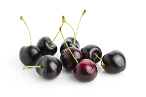 Black cherries with leaves